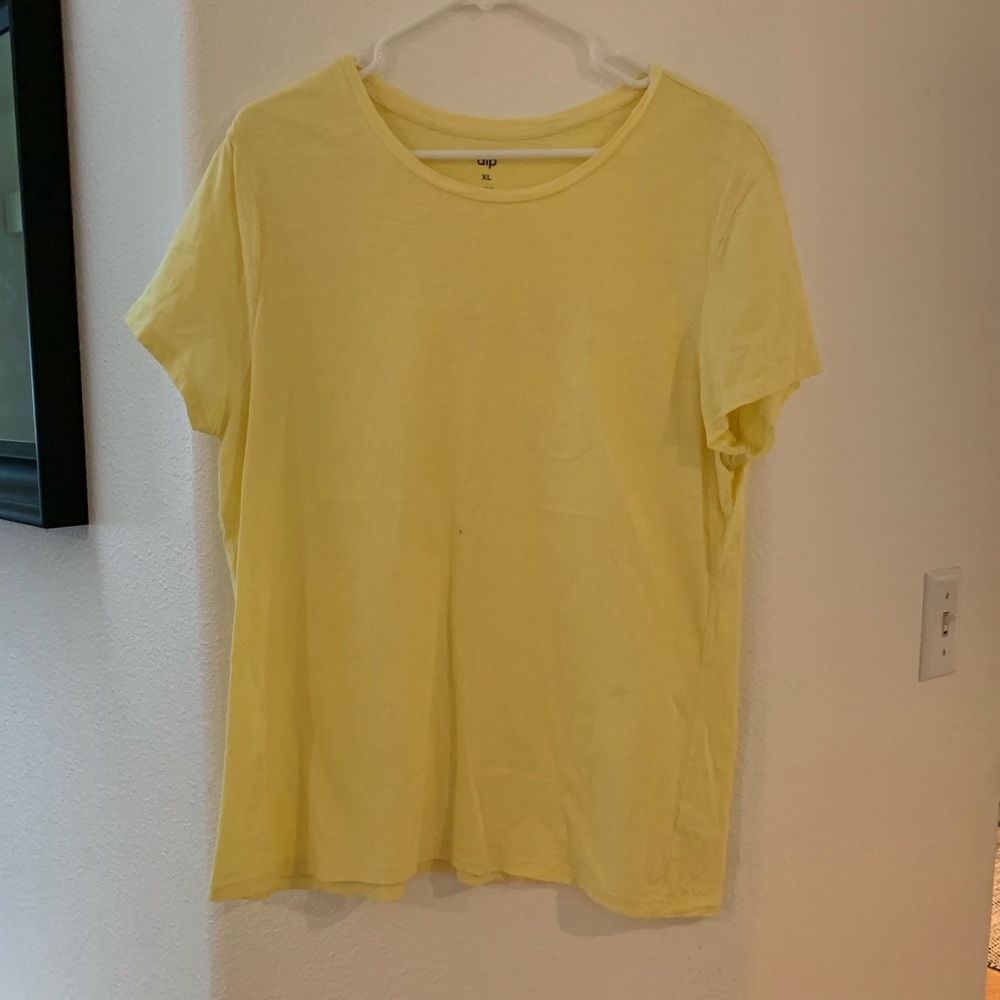 Woman’s yellow tshirt